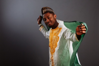 man holding nigeria flag